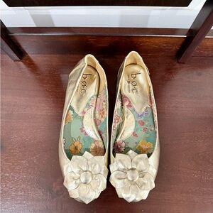 b.o.c. Women's Metallic Gold Flats with Floral Accent